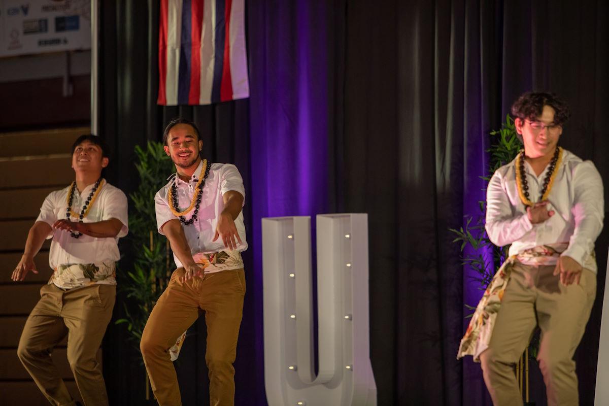 Students dance on stage